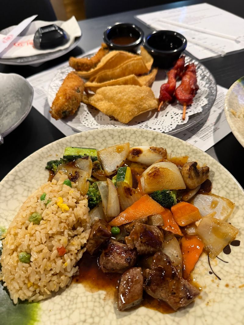 This Nebraska Sushi Spot Turns One Meal Into An All-You-Can-Eat Japanese Feast - Decor Hint Switch From Sushi To Hot Hibachi Plates