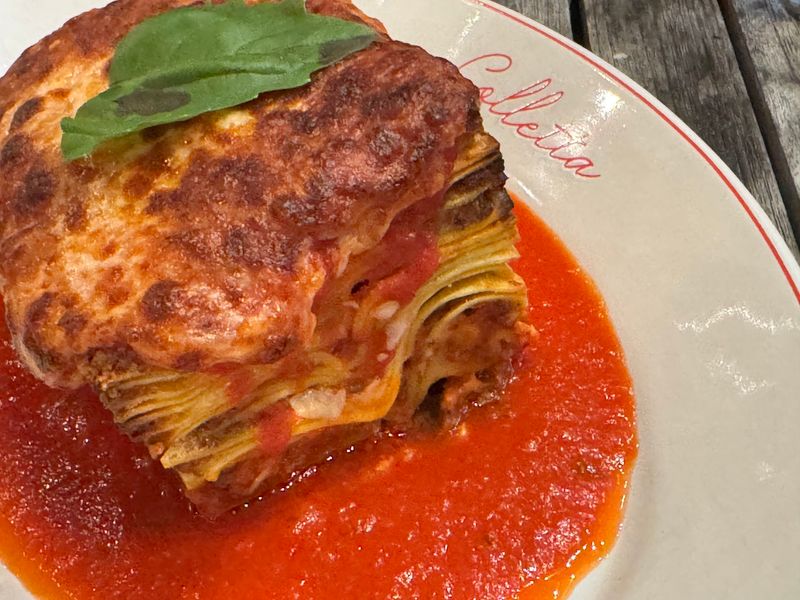 This North Carolina Italian Restaurant Stacks Its Famous Lasagna 15 Layers High - Decor Hint Notice How The Housemade Pasta Keeps All 15 Layers Surprisingly Neat
