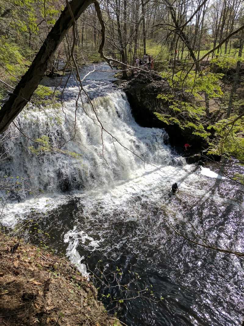 A Scenic Finish Beside The Waterfall