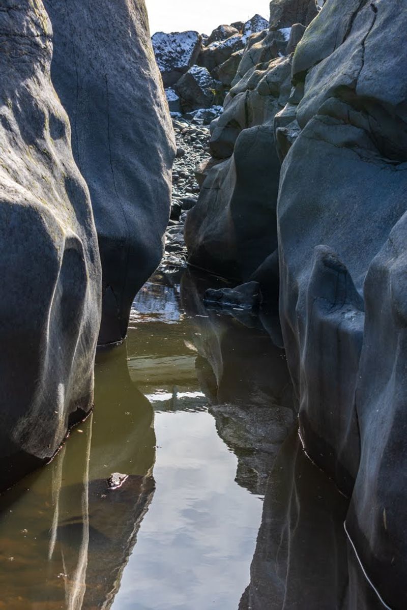 Narrow Passages Twist Between Rock Sculpted By Water Over Time