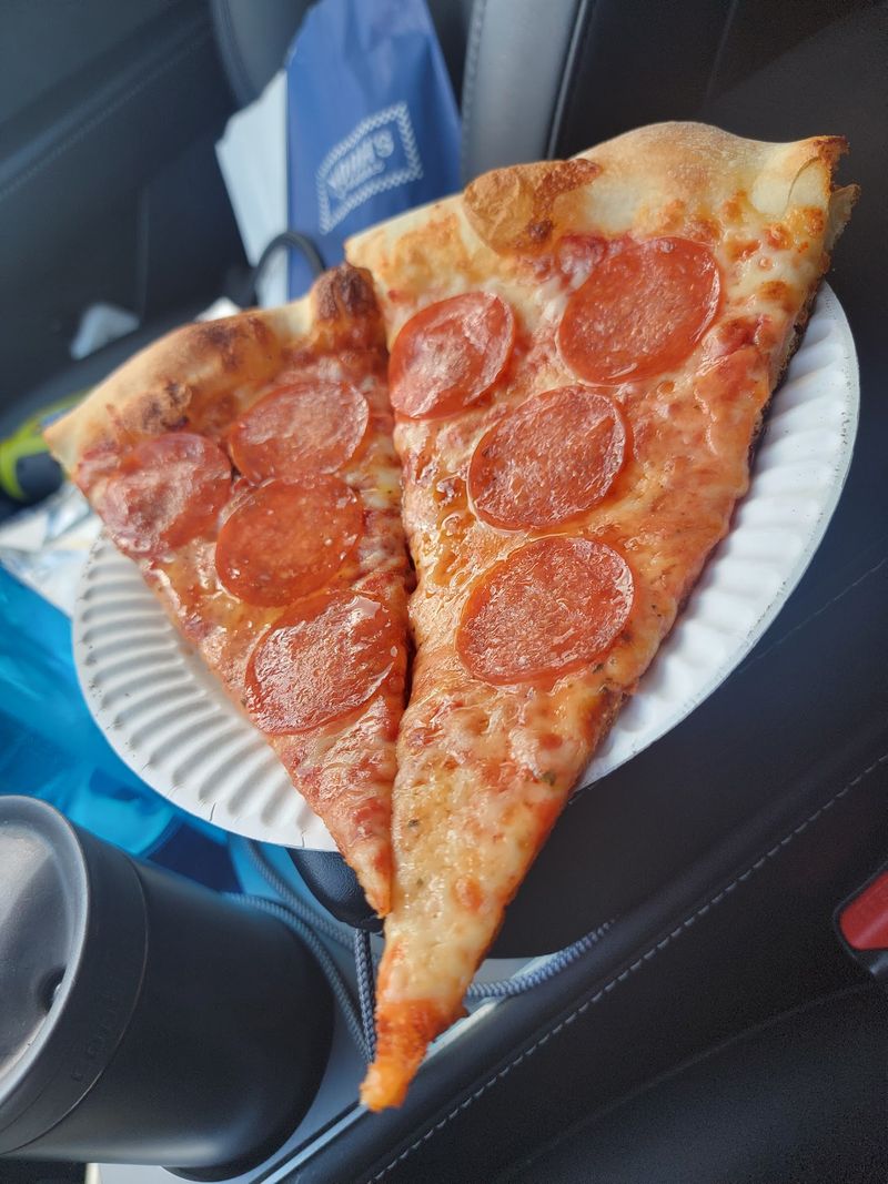 Order The Thin, Crispy New York-Style Pizza Regulars Keep Coming Back For