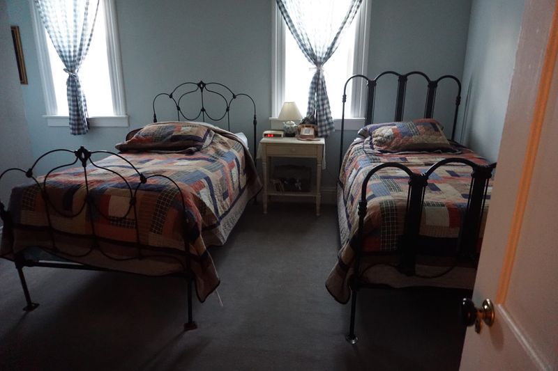 Antiques, Quilts, And Original Furnishings Throughout