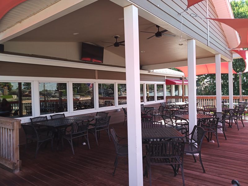 This Nebraska Lakefront Restaurant Serves Huge Seafood Dinners Right By The Water - Decor Hint Outdoor Patio Seating Puts The Lake In Full View