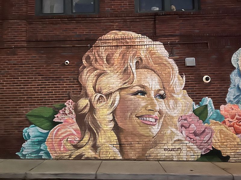Say Goodbye To Beloved Music Legend Dolly Parton At This Colorful North Carolina Mural - Decor Hint Notice How A Salon Wall Turned Into An Unexpected Memorial