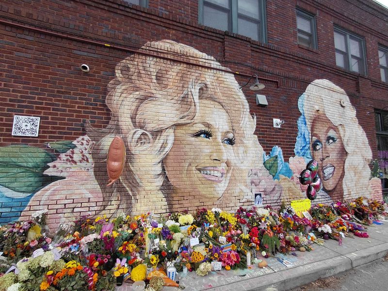 Say Goodbye To Beloved Music Legend Dolly Parton At This Colorful North Carolina Mural - Decor Hint You Can Leave Flowers Notes And Small Tributes Beneath Her Portrait