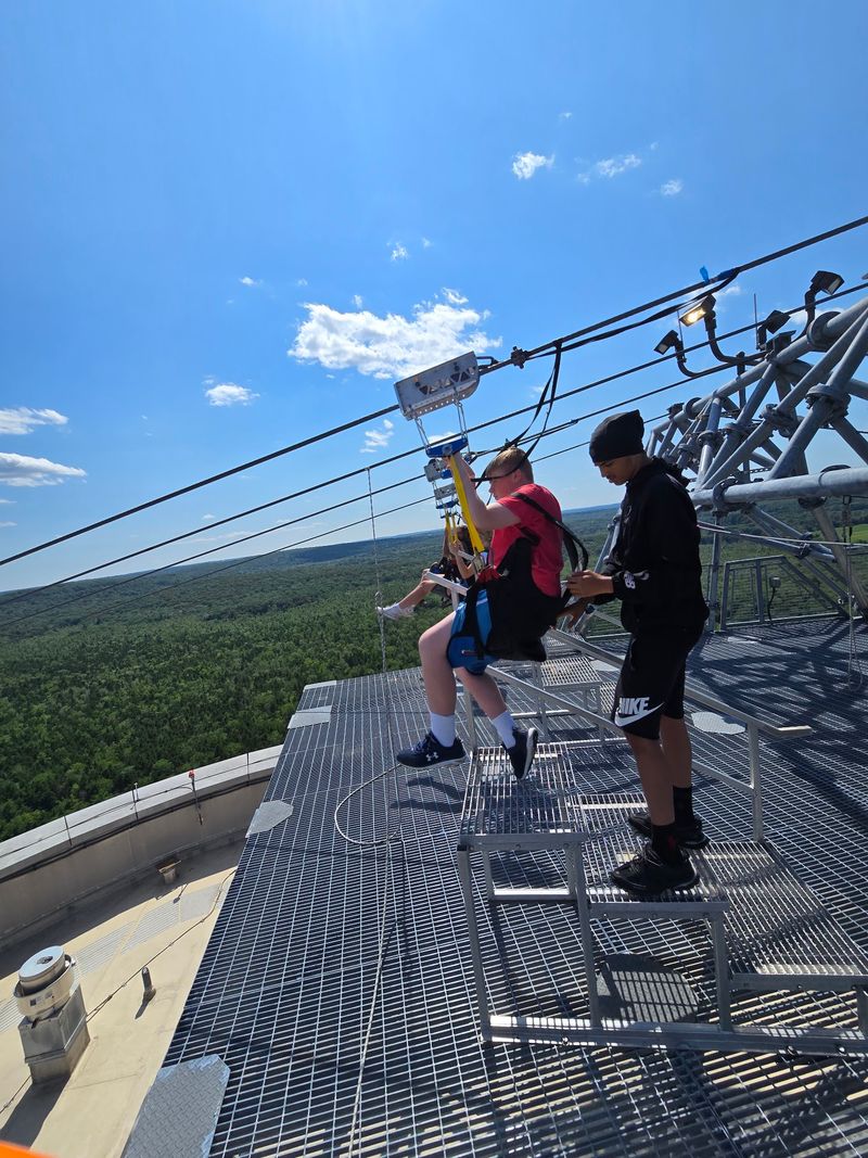 Riders Launch From The Top Of The Fox Tower
