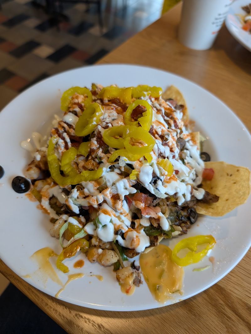 We Found A Nebraska Cheesesteak So Massive And Messy You'll Never Forget It - Decor Hint Sizzle You Can Hear Outside