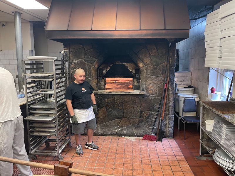 Oil-Fired Brick Ovens Give The Apizza Its Famous Char