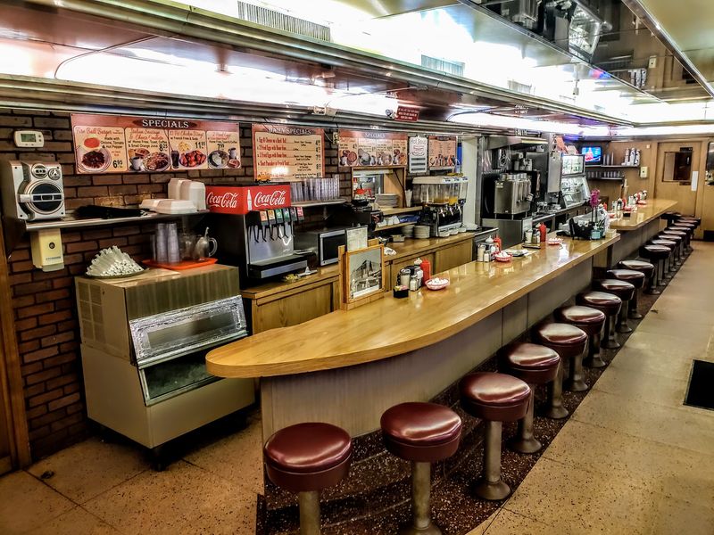 Maroon Swivel Stools Keep The Counter Looking Classic