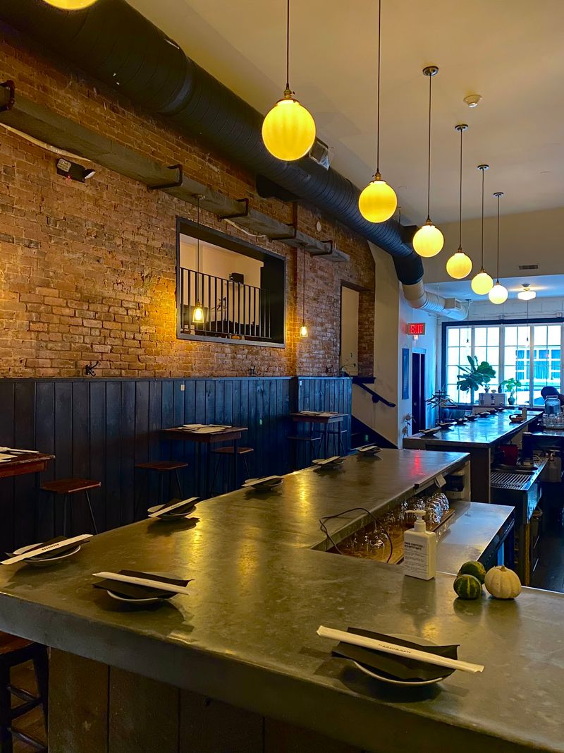 Exposed Brick Keeps The Dining Room Warm And Casual