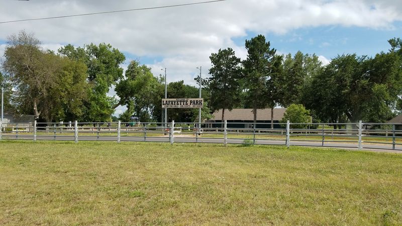 A Covered Footbridge Leads Straight Into Another Park