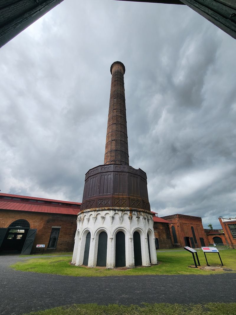 This Georgia Railroad Museum Lets Visitors Ride Historic Trains Through A Working Rail Yard - Decor Hint The 125-Foot Smokestack You Cannot Miss
