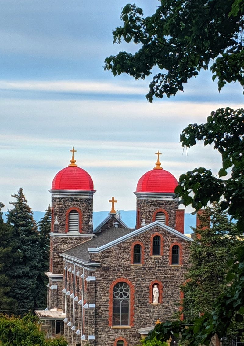 Twin Red Towers Rise Above The Prairie Before You Even Reach The Grounds