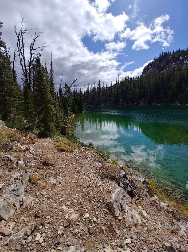 Follow A Mountain Trail To Water So Blue It Barely Looks Real
