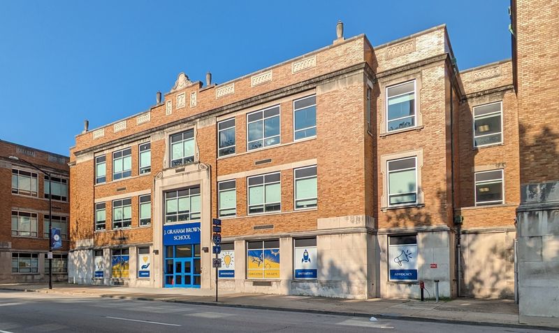 The Brick Building Downtown That Families Compete To Enter