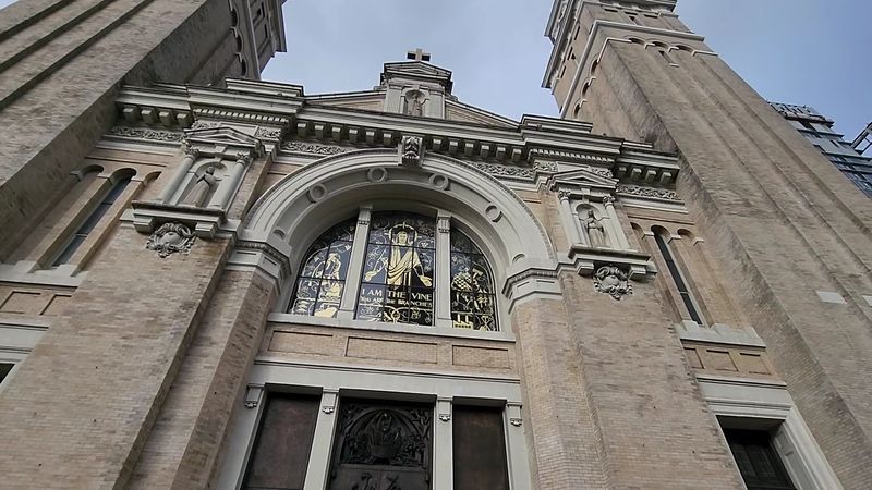 Limestone Saints Guarding The West Facade