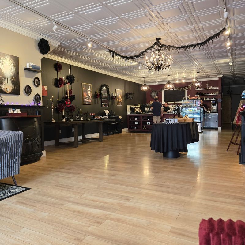 One Of Connecticut's Most Unusual Coffee Shops Feels Like A Mysterious Gothic Escape - Decor Hint Flickering Lanterns Keep The Room Moody