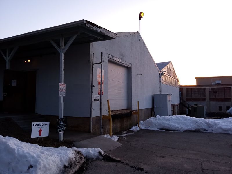 An Old Factory Setting Makes The Entrance Easy To Miss