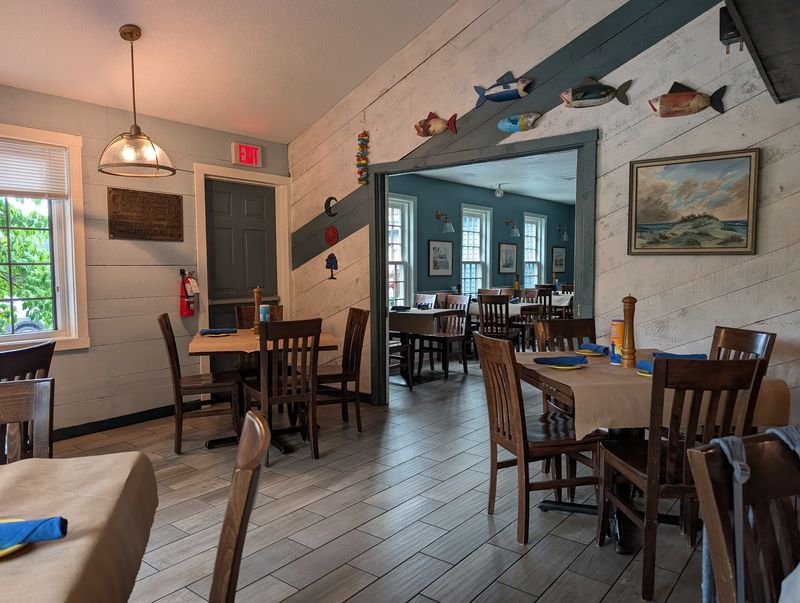 One Of Connecticut's Best Meals Might Be Hiding At This Unassuming Restaurant - Decor Hint The Cozy Dining Room Everyone Appreciates