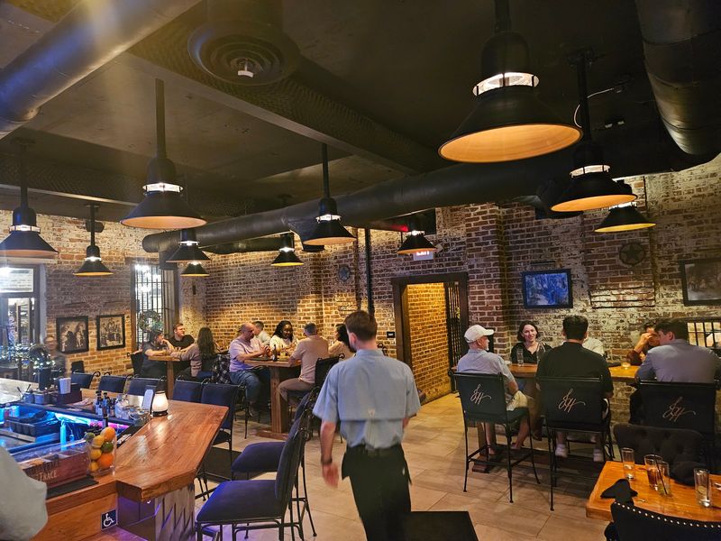 This Florida Restaurant Operates Inside An Old Jailhouse With Its Original Bars - Decor Hint Velvet Chairs Meet Bare Brick