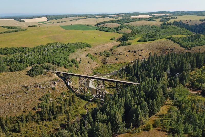 This 30-Mile Idaho Rail Trail Rolls Past Historic Trestles, Open Farmland, And Jaw-Dropping Teton Views - Decor Hint Pause At The Creek Trestle For One Of The Route’s Most Dramatic Stops