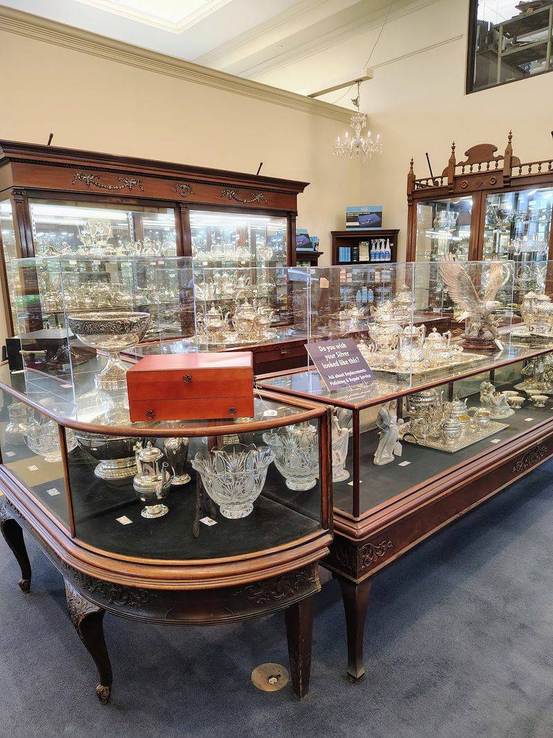 Browse Shelves Packed With Crystal, Silver, And Vintage Tableware