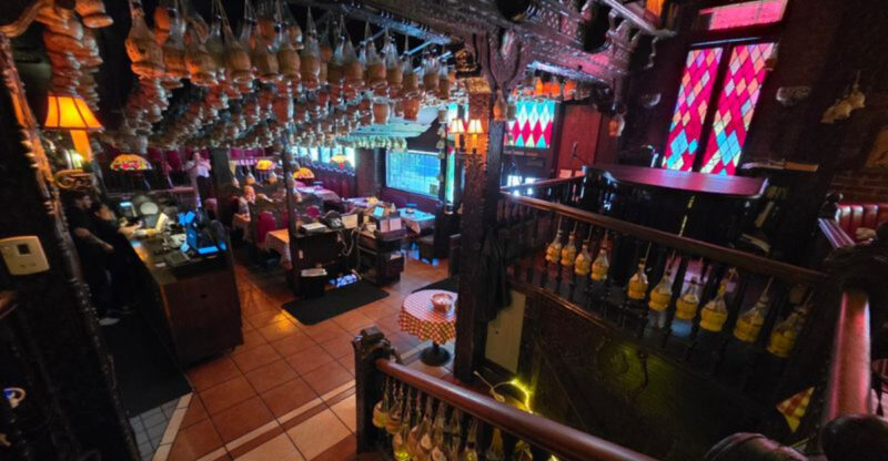 This 77-Year-Old California Italian Restaurant Has Singing Waiters And Customer-Signed Bottles Hanging From The Ceiling