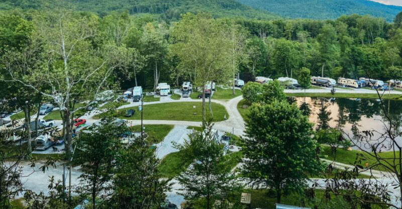 This North Carolina Campground Sits Along 1,300 Yards Of River With Tubing, Swimming, And Mountain Views