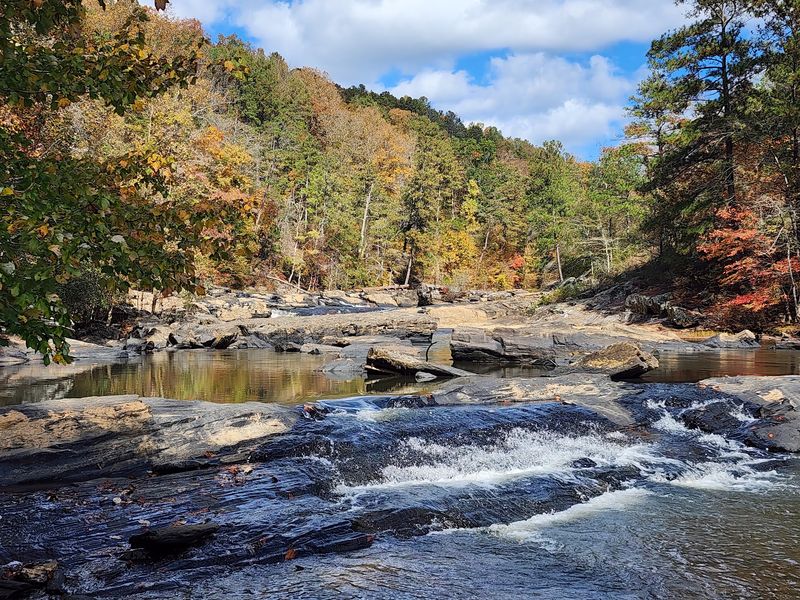 Mill Ruins And Rushing Water Close To The City