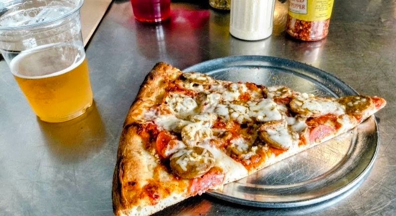 This Old-School Italian Pizzeria In Georgia Has Diners Driving Miles To Eat Here - Decor Hint Slices Big Enough To Need A Game Plan