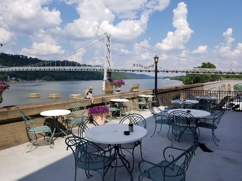 Why Visitors Are Falling Hard For This Small Historic Town In Kentucky - Decor Hint Bridge Views And Barges At Limestone Landing