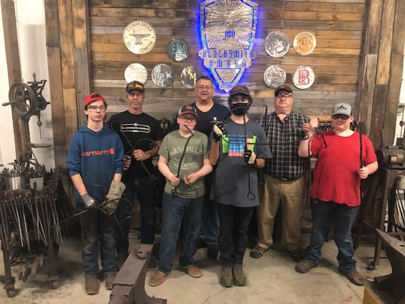 This Nebraska Blacksmith Shop Lets Total Beginners Hammer Out Their Own Knife From A Railroad Tie - Decor Hint Elmo and Kathy, the Couple Behind the Anvil