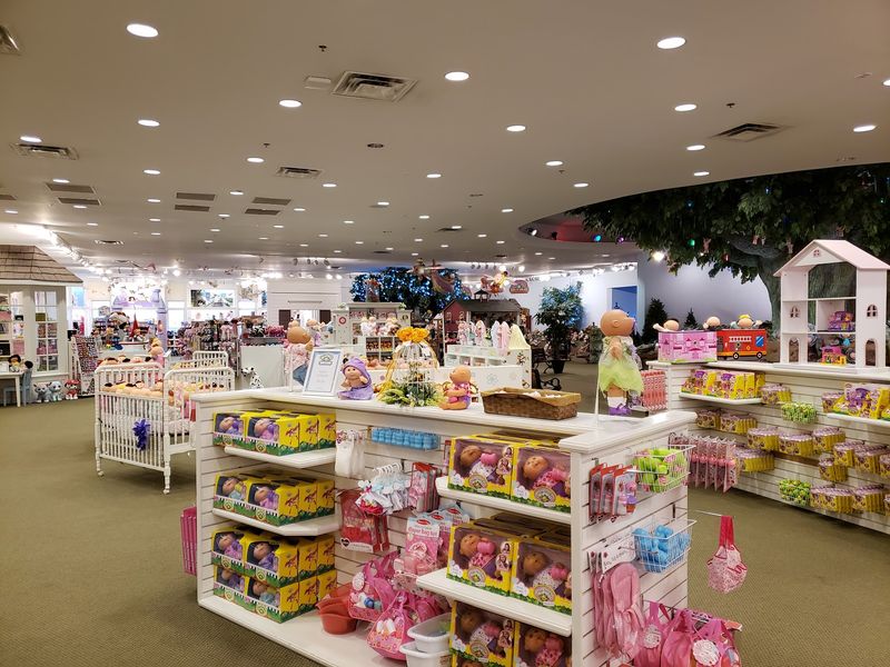 This North Georgia Factory Tour Is A Hidden Attraction Most Travelers Miss - Decor Hint Display Cases Tracing Decades Of Dolls