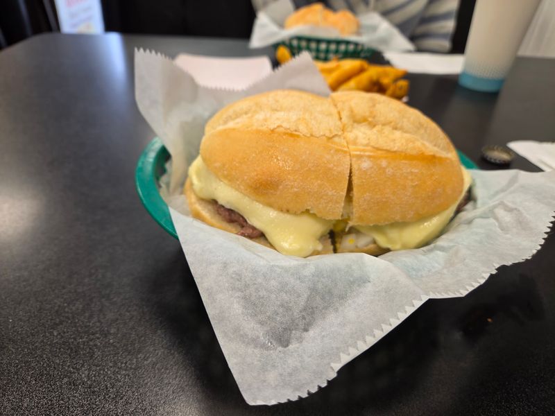 This 67-Year-Old Connecticut Burger Spot Was Just Named Home To The Best Cheeseburger In The State - Decor Hint Melted Cheese Gets The Same Steamy Treatment