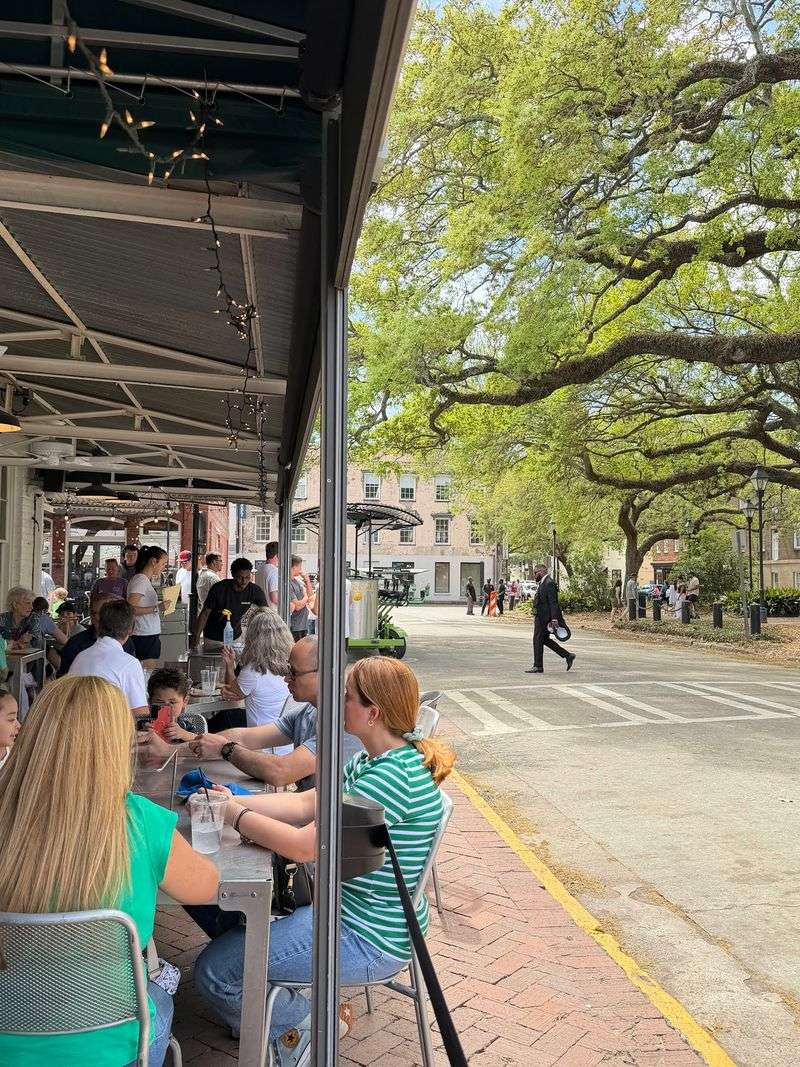 This Old-School Italian Pizzeria In Georgia Has Diners Driving Miles To Eat Here - Decor Hint Patio Seats With The Best Show In Town