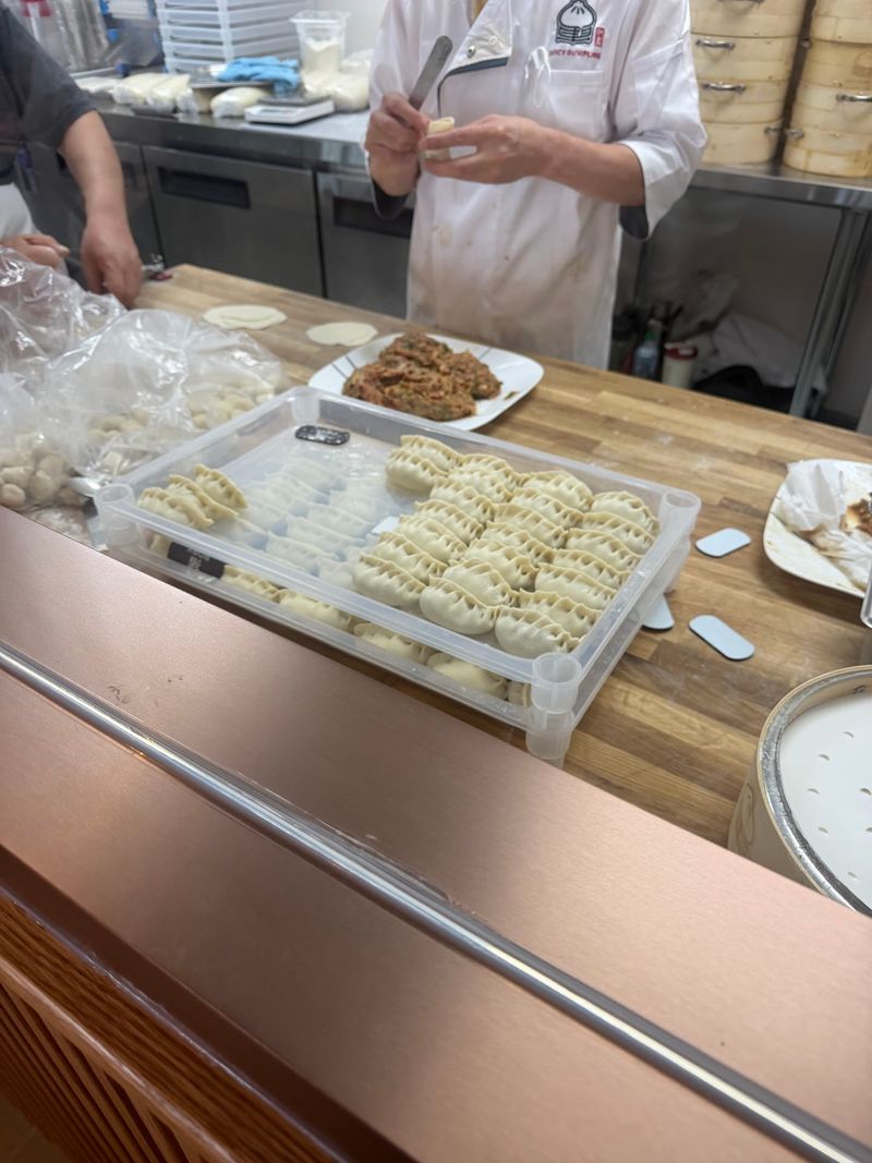 This Brand New North Carolina Restaurant Makes Dumplings Right In Front Of You - Decor Hint Peek Through The Open Kitchen Window