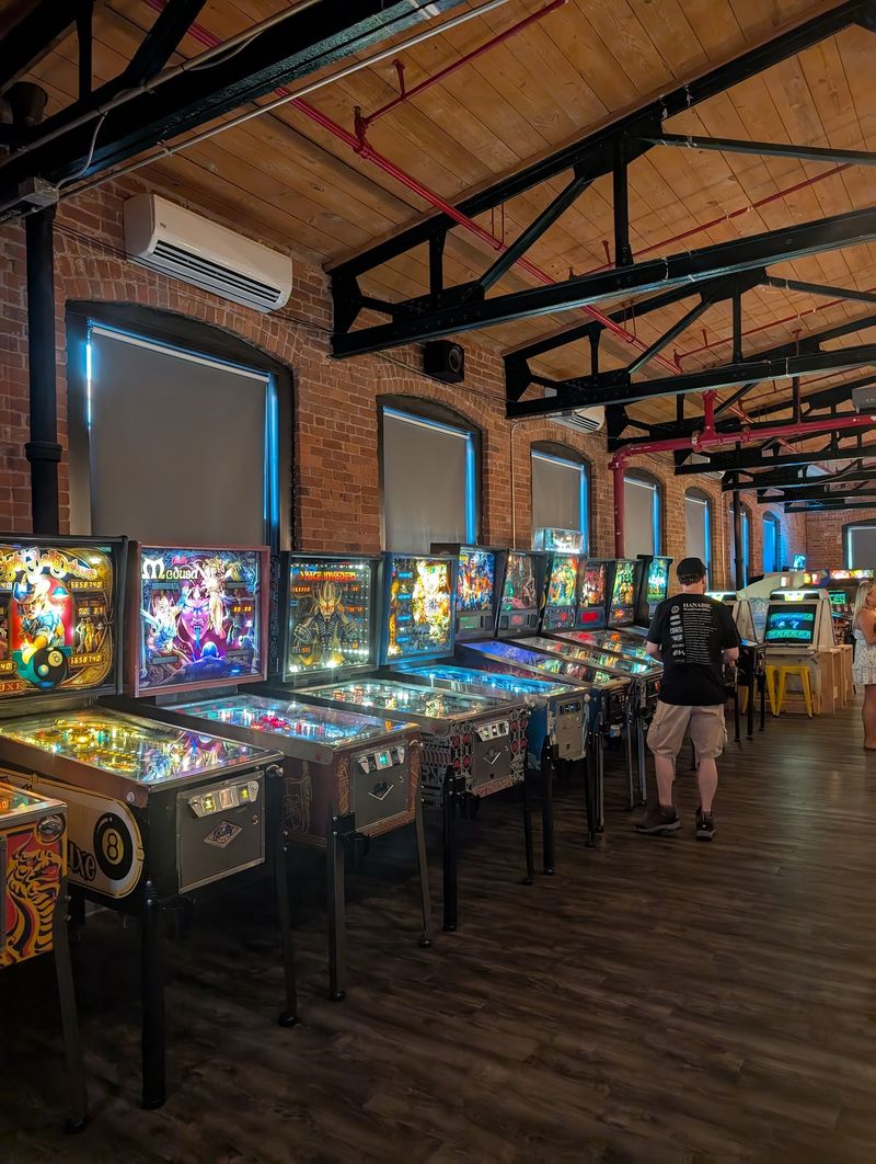 Flashing Pinball Tables Fill The Room