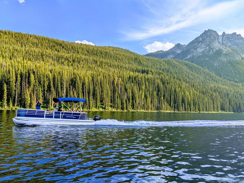 Deep In Idaho's Sawtooths Sits A Lake Where The Peaks Reflect Perfectly At Dawn - Decor Hint Paddles, Pedals, And Motorboats