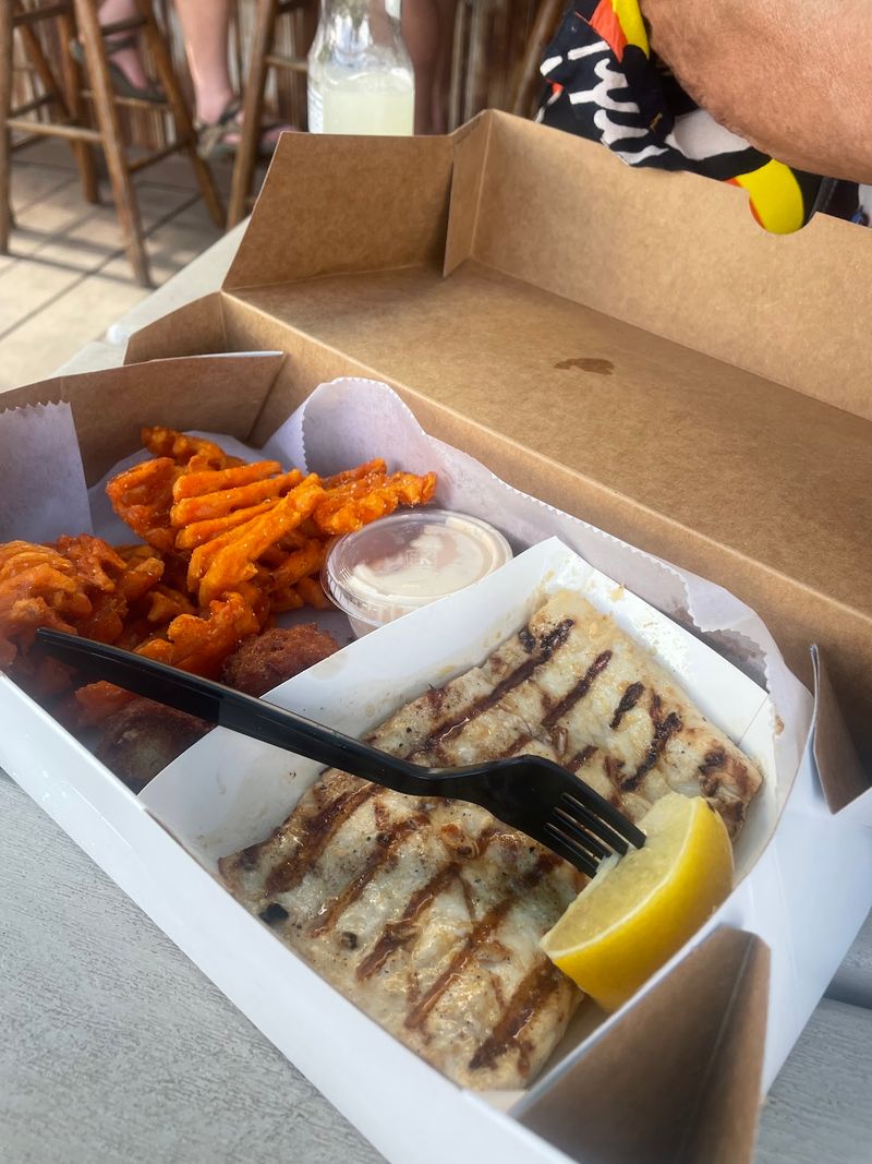 Locals Drive An Hour For The Smoked Mullet At This Florida Fishing Village Smokehouse - Decor Hint Fried Baskets, Hush Puppies, and the Rest of the Board