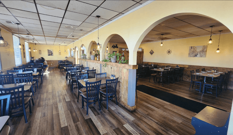Nebraska Travelers Keep Stopping At This Low-Key Restaurant For The Lobster Ravioli - Decor Hint The Dining Room, Dim and Unhurried