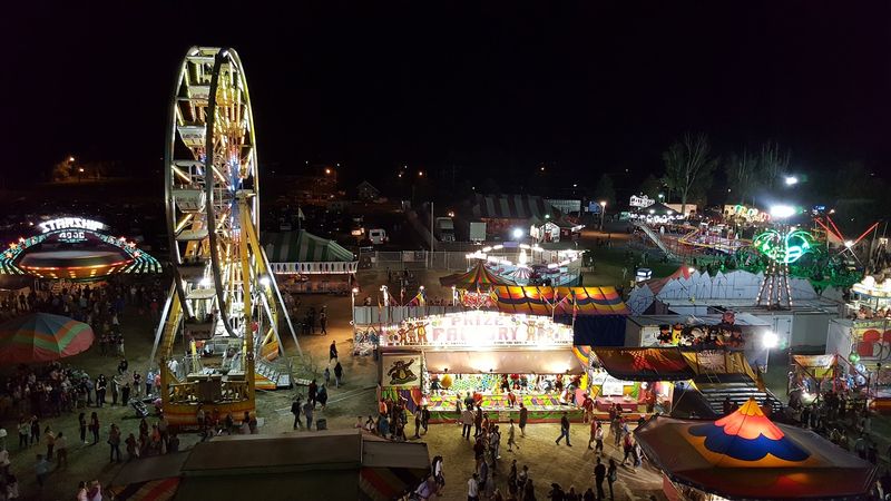 The Carnival Brings Rides, Games, And Bright Lights To Every Evening