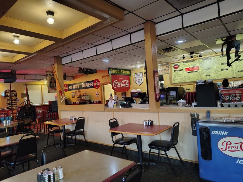 Vintage Signs, Yellow Beams, and Roomy Booths
