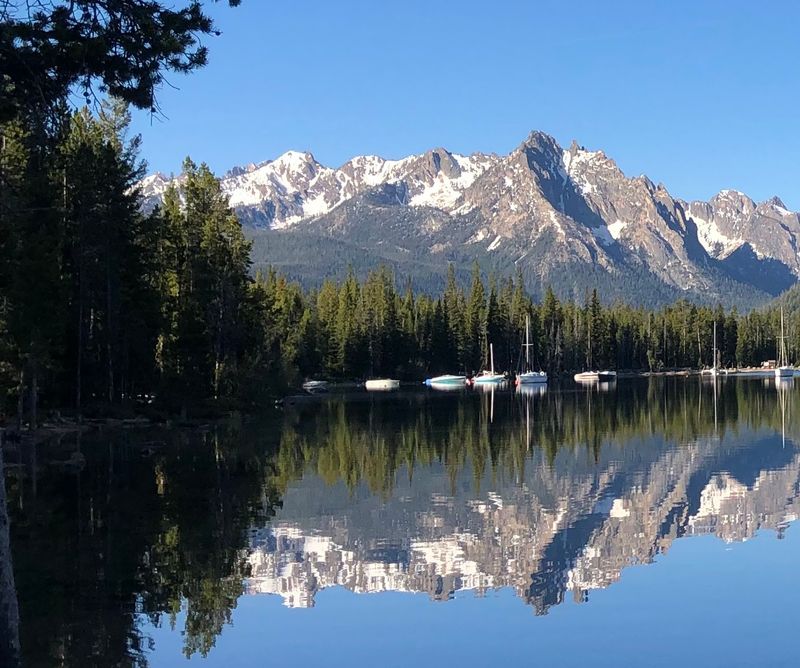Deep In Idaho's Sawtooths Sits A Lake Where The Peaks Reflect Perfectly At Dawn - Decor Hint Where Highway 75 Bends Toward Water