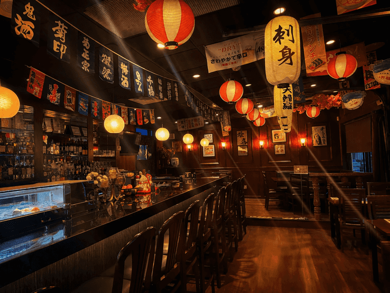 The Connecticut All-You-Can-Eat Sushi Restaurant Where The Rolls Are Made Fresh And The Refills Never Stop - Decor Hint Dim Lighting Gives The Room Izakaya Style