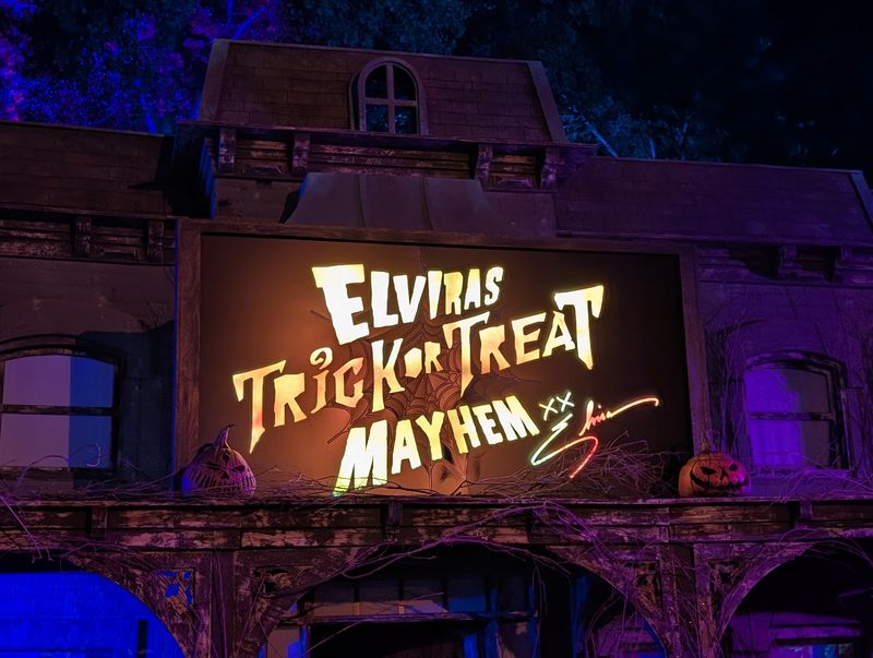 This California Haunted Hayride Drops You Into A Cursed Town Stuck On Halloween Night In 1985 - Decor Hint Elvira's Trick Or Treat Mayhem Returns