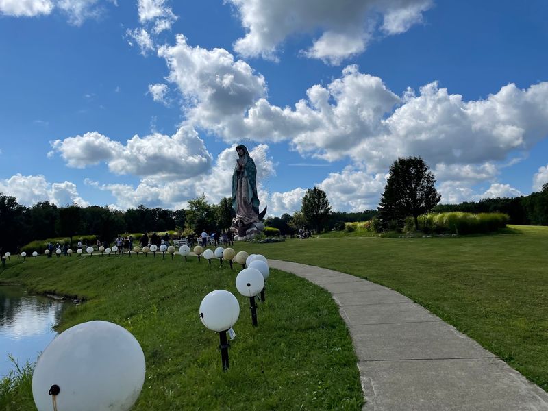 The Monument Rises Above The Peaceful Shrine Grounds