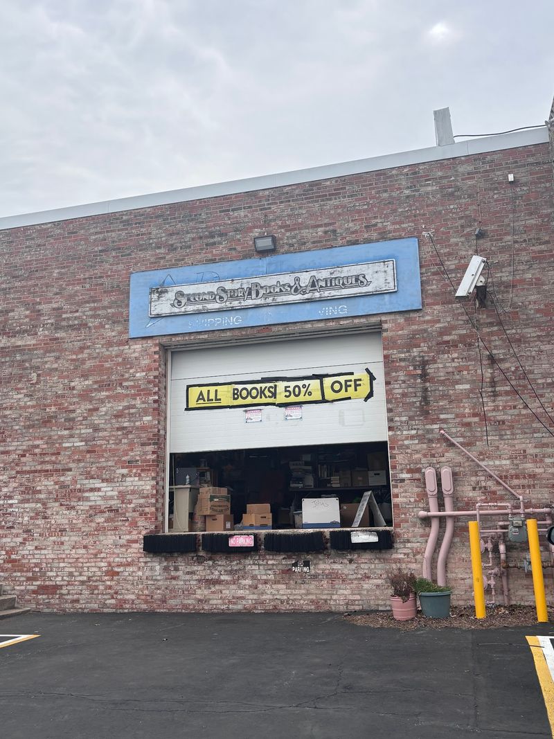 Get Lost In Maryland’s Massive Bookstore That Feels Like A Labyrinth - Decor Hint A Warehouse Door That Hides Half A Million Books