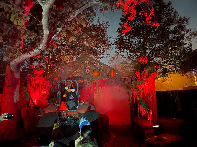 This California Haunted Hayride Drops You Into A Cursed Town Stuck On Halloween Night In 1985 - Decor Hint Madame Aurora's Seance Theater Is New