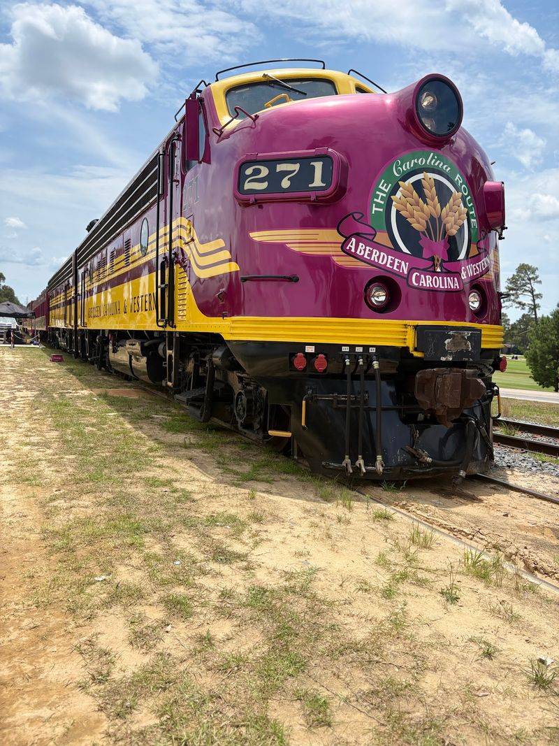 Christmas Carols Fill The Cars As The Train Rolls Through Central North Carolina