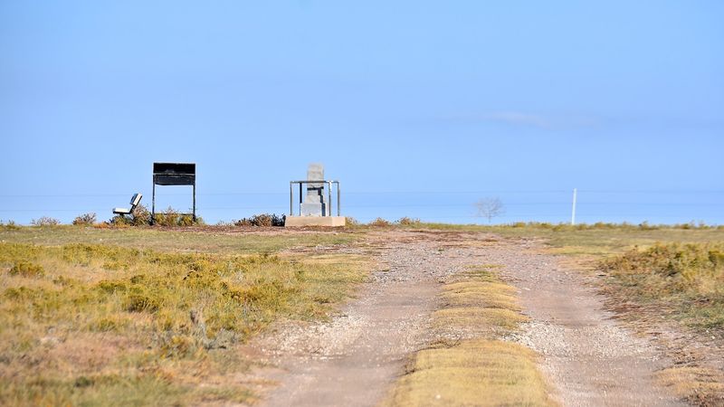 The Stone Monument, the Bench, and the Guest Register